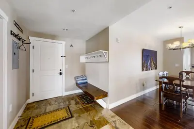 a kitchen and dining room with a table and a dining room at Base Camp One 316 in Granby