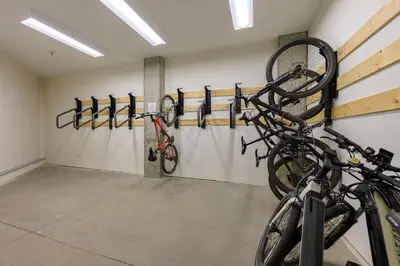 a room with bikes hanging on a wall at Timber Fox 2207 condo in Winter Park