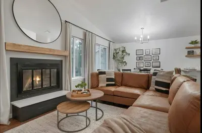 a living room with a couch and a fireplace at Colorado Retreat in Westminster