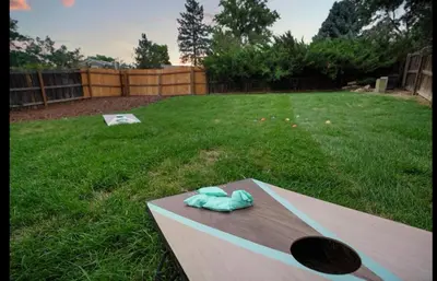 a pair of slippers sitting on a table in a yard at Colorado Retreat in Westminster