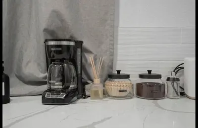 a kitchen counter with a coffee maker and other appliances at Colorado Retreat in Westminster