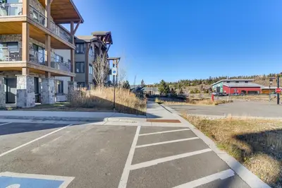 an empty street in front of a building at 5 Mi to Winter Park Skiing and Dtwn Mtn-View Condo in Fraser
