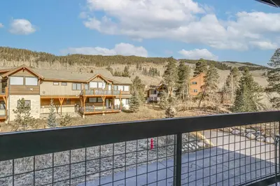 a view from the balcony of a house at Family Ski Trip! Upscale Keystone Condo Near Lift in Dillon