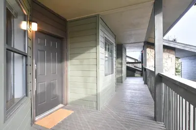 a front door of a house with a porch at Mountainside Aspenview Condo - Great Year-Round Location in Frisco