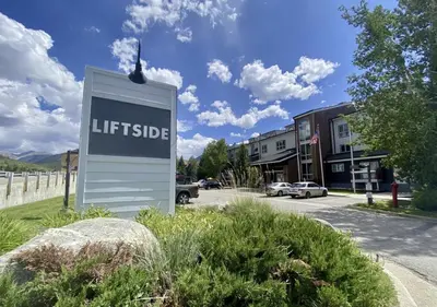 a sign for a hotel in a parking lot at Liftside Condo - Walk to Lifts, Pool Hot Tub in Keystone