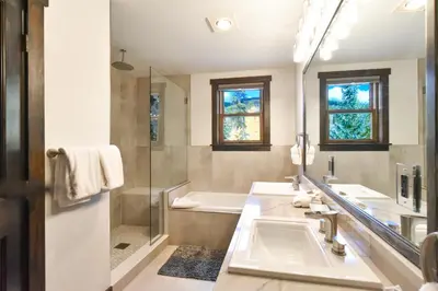 a bathroom with a tub and a sink and a shower at Red Hawk Townhome - Walk to Lifts, Pool/Hot Tub Access in Keystone