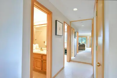 a bathroom with a sink and a mirror at Timber Ridge Retreat - Pool, Hot Tub, Sauna + More in Silverthorne