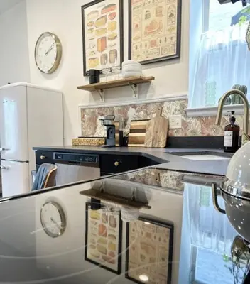 a kitchen with a sink and a refrigerator and a counter at RiNo Retreat Flat walkable and great location in Denver