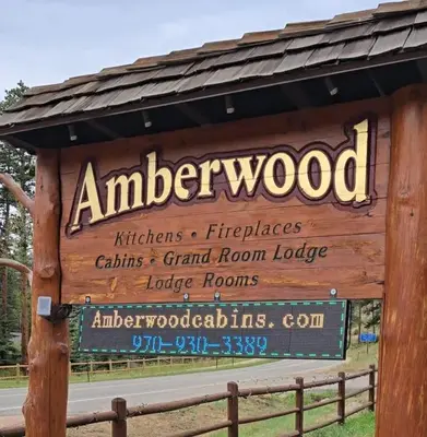 a sign at the entrance to aniger wood at Cabin 21- Accessible Unit & King Bed in Estes Park