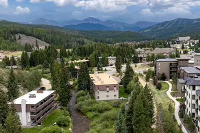 an aerial view of a city with trees and buildings at Winter Park Condo with Fireplace, Centrally Located in Winter Park