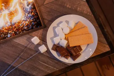 a plate of cheese and crackers on a table at Ski Granby Ranch five minutes from the house in Granby