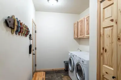 a laundry room with a washer and dryer at Spacious Pet-Friendly Grand Lake House in Grand Lake