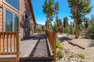 a wooden walkway leading to a house at Spacious Pet-Friendly Grand Lake House in Grand Lake