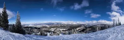 a view of a snow covered mountain with trees on it at Winter Park 3BR Townhouse with Mountain views in Fraser