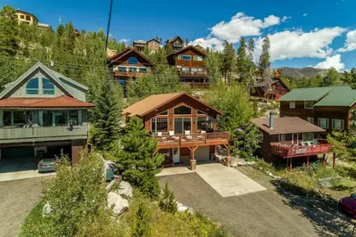 an aerial view of a house in a mountain at Rocky Mountain High - Pet Friendly in Grand Lake