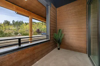 a room with a window and a potted plant at Cozy Grand Lake Hideaway Walk to Lake and Restaurants in Grand Lake