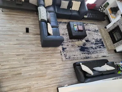 an overhead view of a living room with wood floors at Denver Layover B&B in DEN