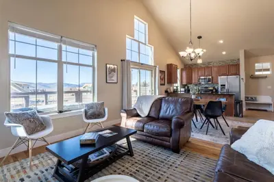 a living room with a couch and a table at 3 BR Private Mountain Retreat in Granby