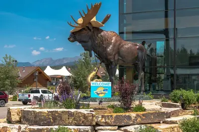 a statue of a moose in front of a building at Luxury Getaway in Winter Park Fraser in Granby