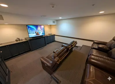 a waiting room with a couch and a flat screen tv at Springs 8886 by SummitCove Lodging in Keystone