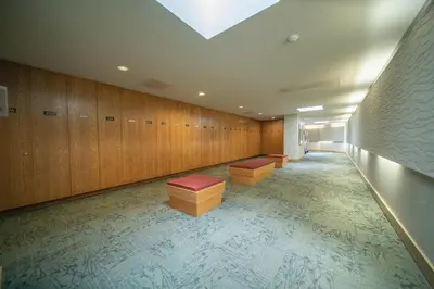 a waiting room with benches and a skylight at Saints John 2525 by SummitCove Lodging in Keystone