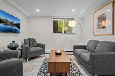 a living room with two couches and a coffee table at 1815 Bluebell New in Boulder