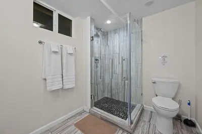 a bathroom with a shower and a toilet at 1815 Bluebell New in Boulder