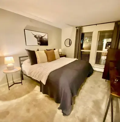 a bedroom with a large bed and a window at Lake & Mountain Views, 2BR, 2 BA in Dillon