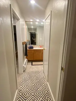 a bathroom with a sink and a mirror at Lake & Mountain Views, 2BR, 2 BA in Dillon
