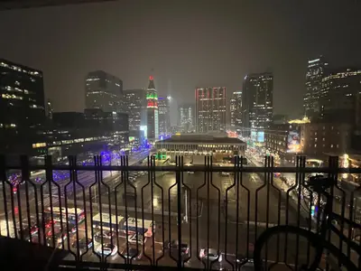 a view of a city at night with cars at Stylish Stay In Downtown Denver in Denver