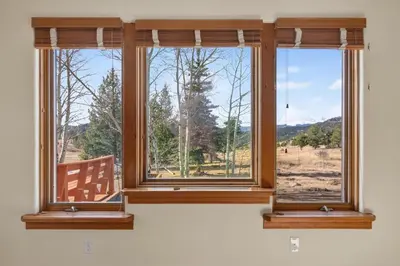 three windows in a room with a view at Scenic Mountain Home, Media Room, TT, Gym in Boulder