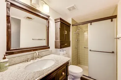 a bathroom with a sink and a shower and a toilet at 1 Mi to CU Boulder! Walkable Condo with Indoor Pool in Boulder