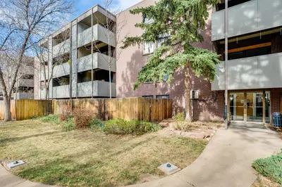 an external view of a brick building at 1 Mi to CU Boulder! Walkable Condo with Indoor Pool in Boulder
