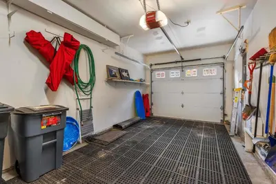 a garage with a red umbrella hanging on the wall at Keystone Gulch - Near Keystone Resort & Golf in Keystone