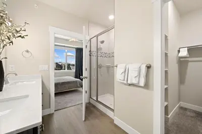 a bathroom with a shower and a sink at The Landmark with Two King Beds, Garage and Fireplace in Fort Collins