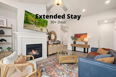 an extended stay days in a living room with a fireplace at The Landmark with Two King Beds, Garage and Fireplace in Fort Collins
