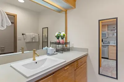 a bathroom with a sink and a mirror at Slopeside Unit 2755 in Keystone