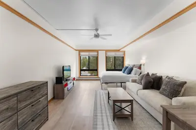 a living room with a couch and a bed at Slopeside Unit 2755 in Keystone
