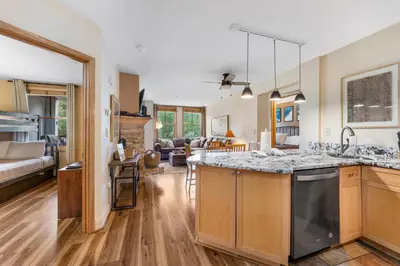 a kitchen and living room with a large counter top at Silver Mill Unit 8272 in Keystone