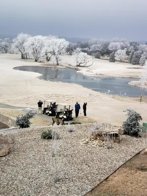 a group of people standing in front of a lake at Scenic Golf Course Retreat near CSU & Estes Park! in Loveland