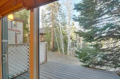 an open door to a porch of a house at Hot Tub and Heated Pool! Ski Retreat in Winter Park in Winter Park