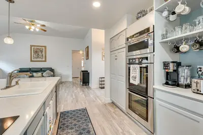 a kitchen with a sink and a stove at 4 Mi to TPC Colorado Dog-Friendly Gem in Berthoud in Berthoud