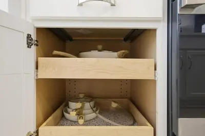 a drawer in a kitchen with a tea pot at Sleeps 8, Fire pit, Near DIA & Downtown Denver in Commerce City