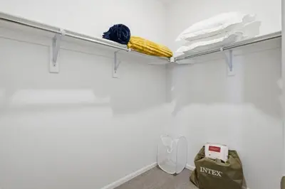 a room with a shelf with a yellow object on it at Sleeps 8, Fire pit, Near DIA & Downtown Denver in Commerce City