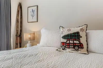 a bedroom with a bed with a pillow on it at 2963 Key Condo condo in Keystone