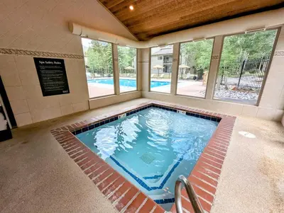 a large swimming pool in a building at Flying Dutchman 1109 by SummitCove Lodging in Keystone