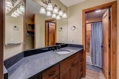a bathroom with a sink and a mirror at Breckenridge 2BR Ski and Mountain Adventure Base in Breckenridge