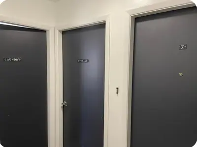 three black doors with the word entry on them at My hidden gem in Denver