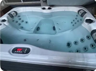 a bath tub with a clock on the side of it at My hidden gem in Denver