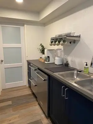 a kitchen with a sink and a counter top at Apartment in Ft Collins in Fort Collins